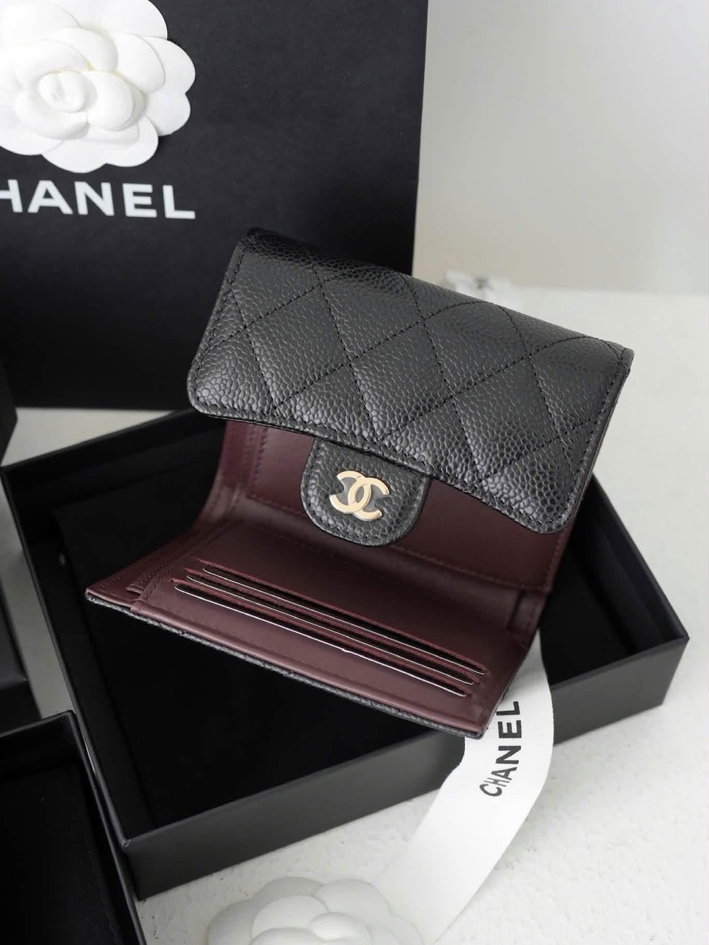 CHANEL Black Quilted Caviar Leather Compact Wallet with Burgundy Interior